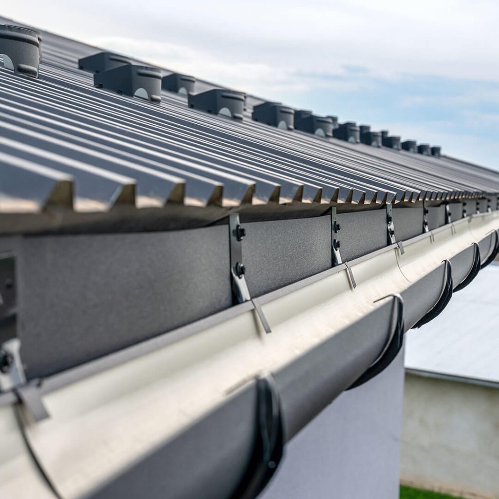 Gutters on a metal roof in Alabama